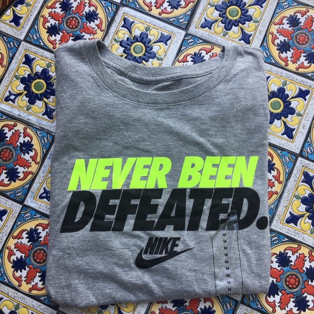 Nike Graphic tee “Never been defeated”